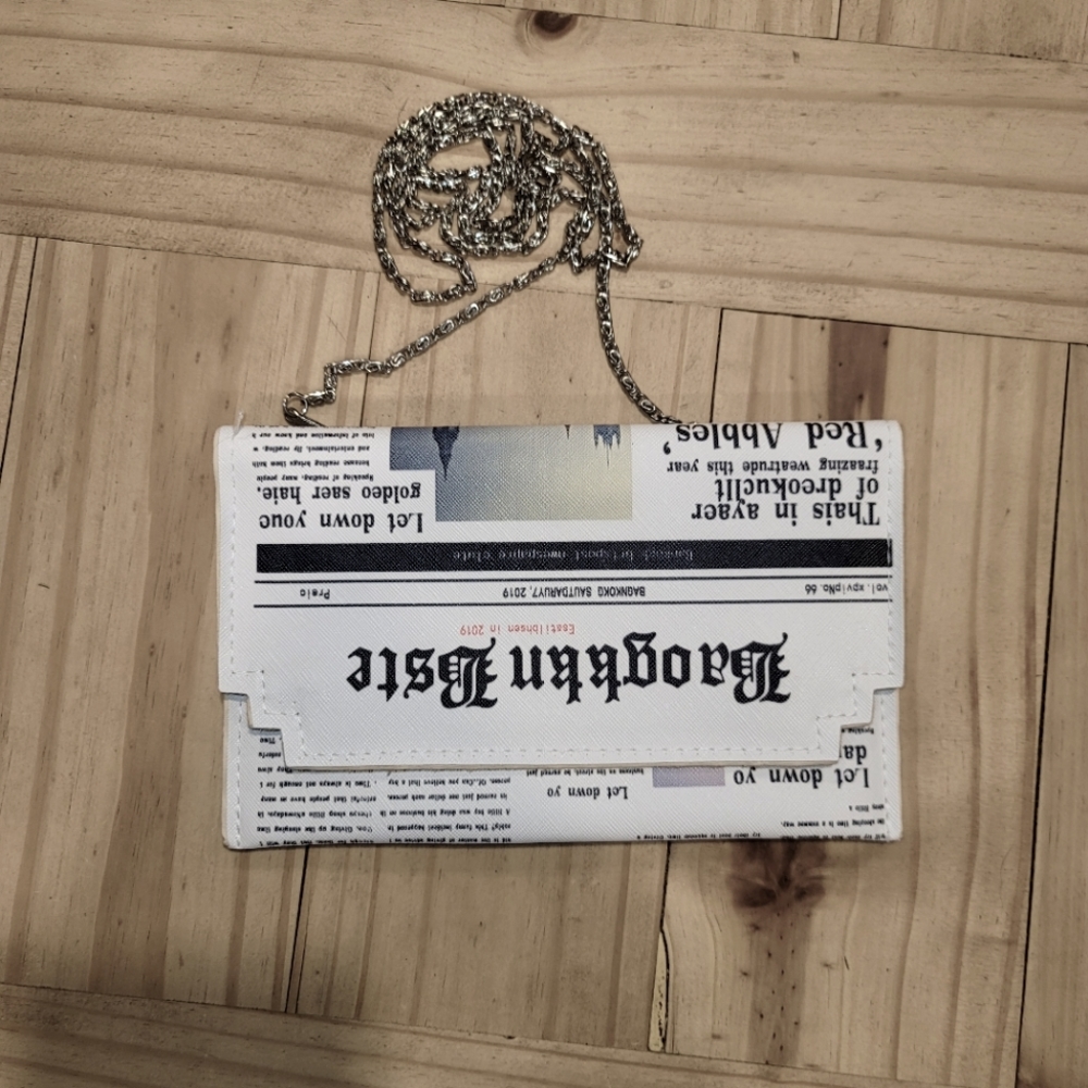 Unique newspaper clutch bag with chain